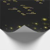 Goud en sparkles sterren op zwart cadeaupapier (Hoek)