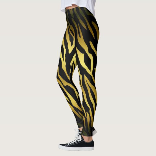Goud en zwart bontwerk, tijgerstrepen pat leggings (Links)