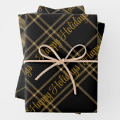 Goud en zwart geplakt met kersttekstomloop inpakpapier vel (In situ)