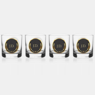 Goud en zwart whiskey glas