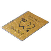Goud huwelijksgastenboek | dubbel hart en pijl notitieboek (Linkerzijde)