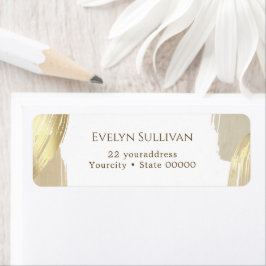 Goud label met penseelstreken retouradres
