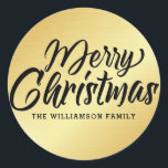 Goud Modern Script Merry Christmas Gepersonaliseer Ronde Sticker<br><div class="desc">Voeg dit gouden Kerst sticker of envelopzegel toe aan uw kerstkaarten of kerstuitnodigingen om ze te verfraaien. Het zou er ook geweldige uitzien op je kerstcadeaus. Een glad gouden oppervlak bevat Merry Christmas in een zeer populair cursief script lettertype. Jouw naam is hieronder in een eenvoudig en minimalistisch lettertype geschreven....</div>