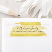 Goud sticker met penseelstreek teruggeven adres (Insitu)