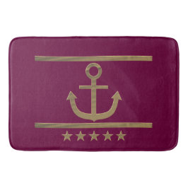 goudanker op rode wijnachtergrond badmat