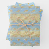 Goudbijen op blauw en goud inpakpapier vel (In situ)