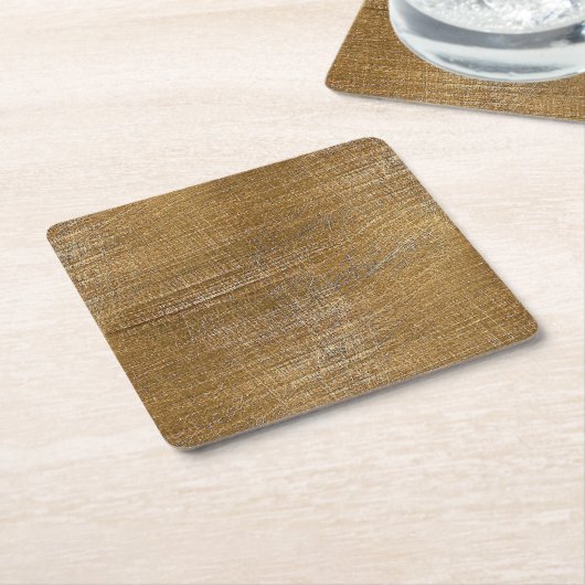 Goudblik in geborsteld goud kartonnen onderzetters (Schuin)