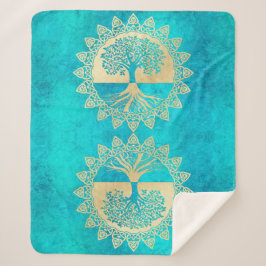 goudboom op Turquoise Sherpa Deken