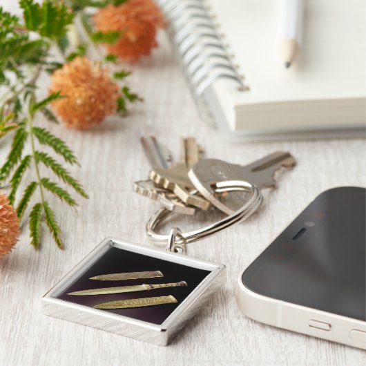 gouddolk en mantel sleutelhanger (Zijkant)