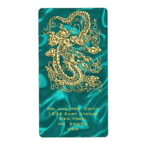 Gouddraak in reliëf op Turquoise Satin Print Etiket
