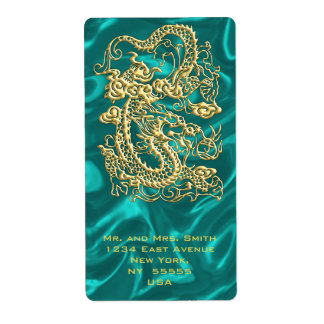 Gouddraak in reliëf op Turquoise Satin Print Etiket