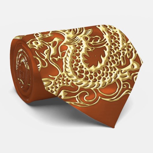 Gouddraak in reliëfdruk op Oranje satijnafdruk Stropdas (Opgerold)