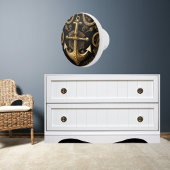 Gouden anker op zwart keramische knop