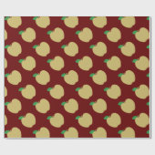 Gouden appel op rood cadeaupapier (Vlak)