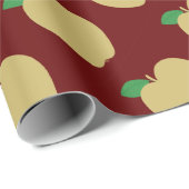 Gouden appel op rood cadeaupapier (Rol Hoek)