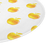 Gouden appels op wit snijplank (Hoek)