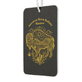 Gouden buffel grazen onder de zon in de buurt van luchtverfrisser (Links)