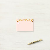 Gouden Confetti op Coral Pink Post-It Notes (Op bureau)