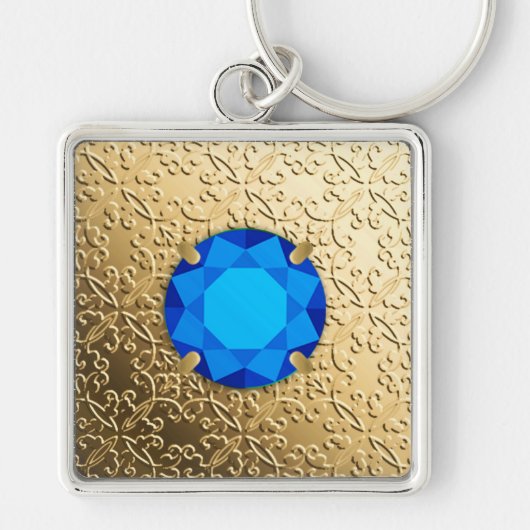 Gouden damast met een nepsaffier edelsteen sleutelhanger (Voorkant)
