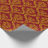 Gouden damast op rood cadeaupapier (Hoek)