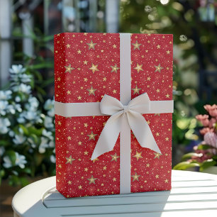 Gouden en Rode Kerststerren Patroon Cadeaupapier