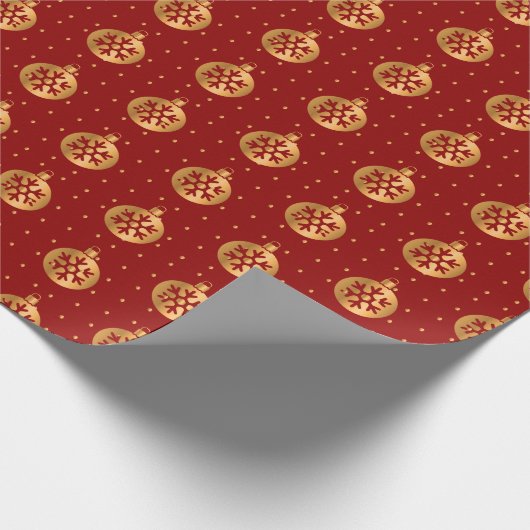 Gouden en rode kerstversieringen cadeaupapier (Hoek)