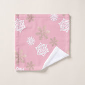 gouden en witte sneeuwvlokken tegen bleek roze bad handdoek (Wasdoekje)