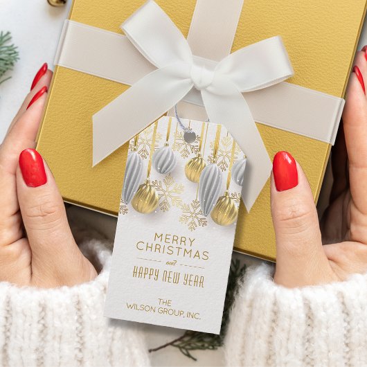 Gouden en zilveren kerstversiering cadeaulabel