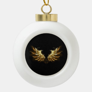 Gouden engelenvleugels op een zwarte achtergrond keramische bal ornament