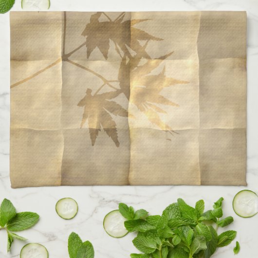 Gouden esdoorn verlaten perkament papier ziet er e theedoek (Gevouwen)