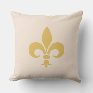 Gouden Fleur de Lis op lichte champagnebeige Kussen