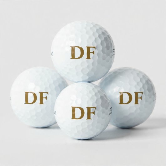 Gouden gegraveerde golfballen