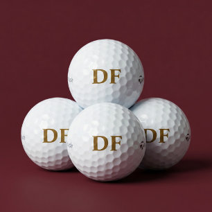 Gouden gegraveerde golfballen