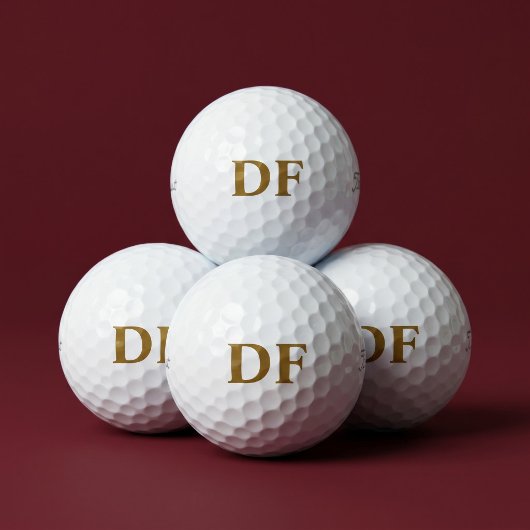 Gouden gegraveerde golfballen
