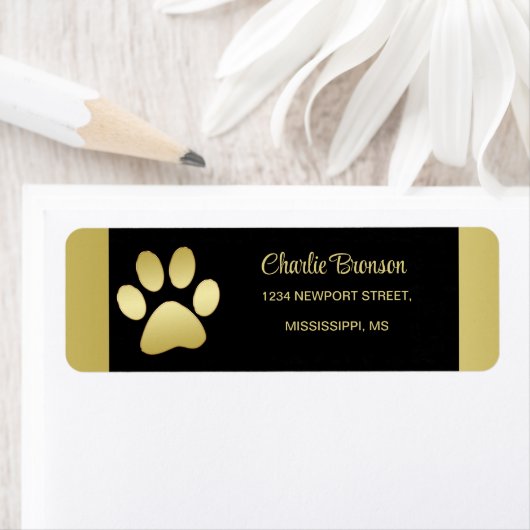 Gouden glanzende hondenpoot op zwarte achtergrond etiket (Insitu)