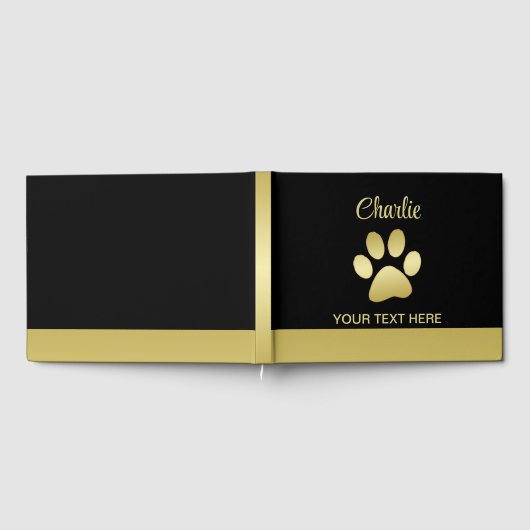Gouden glanzende hondenpoot op zwarte achtergrond gastenboek (Volledig)