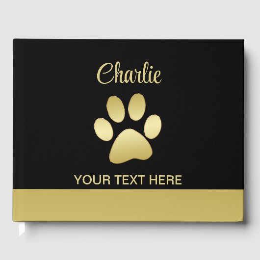 Gouden glanzende hondenpoot op zwarte achtergrond gastenboek (Voorkant)