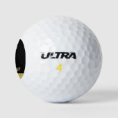 Gouden glanzende hondenpoot op zwarte achtergrond golfballen (Logo)