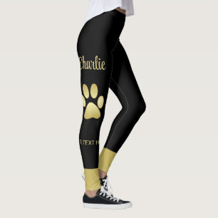 Gouden glanzende hondenpoot op zwarte achtergrond leggings