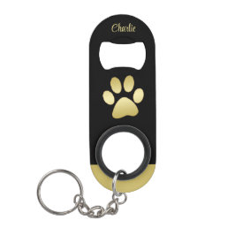 Gouden glanzende hondenpoot op zwarte achtergrond mini flessenopener