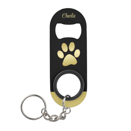 Gouden glanzende hondenpoot op zwarte achtergrond mini flessenopener (Voorkant)