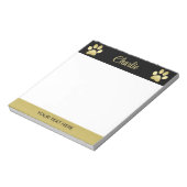 Gouden glanzende hondenpoot op zwarte achtergrond notitieblok (Linkerzijde)