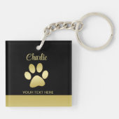 Gouden glanzende hondenpoot op zwarte achtergrond sleutelhanger (Achterkant)