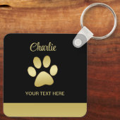 Gouden glanzende hondenpoot op zwarte achtergrond sleutelhanger (Achterkant)