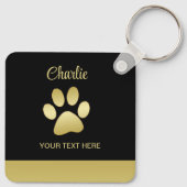 Gouden glanzende hondenpoot op zwarte achtergrond sleutelhanger (Achterkant)