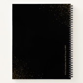 Gouden glitter schittert op zwart notitieboek (Achterkant)