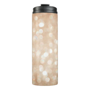 gouden glitter wazige achtergrond, kerst thermosbeker