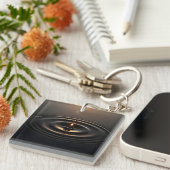 Gouden impact op het viskeuze oppervlak sleutelhanger (Voorkant Rechts)