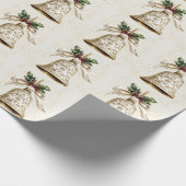 Gouden kerstbel Glanzende sterren Groene bladeren Cadeaupapier (Hoek)