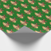 gouden kerstbellen op groen cadeaupapier (Hoek)